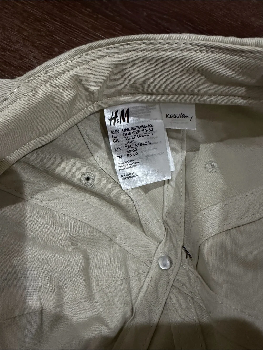 H&M Keith Haring Beige Baseball Cap with Red Heart Graphic